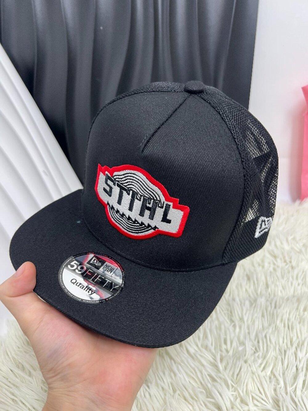 STIHL Logo Embroidered Black New Era Mesh Trucker Snapback Hat